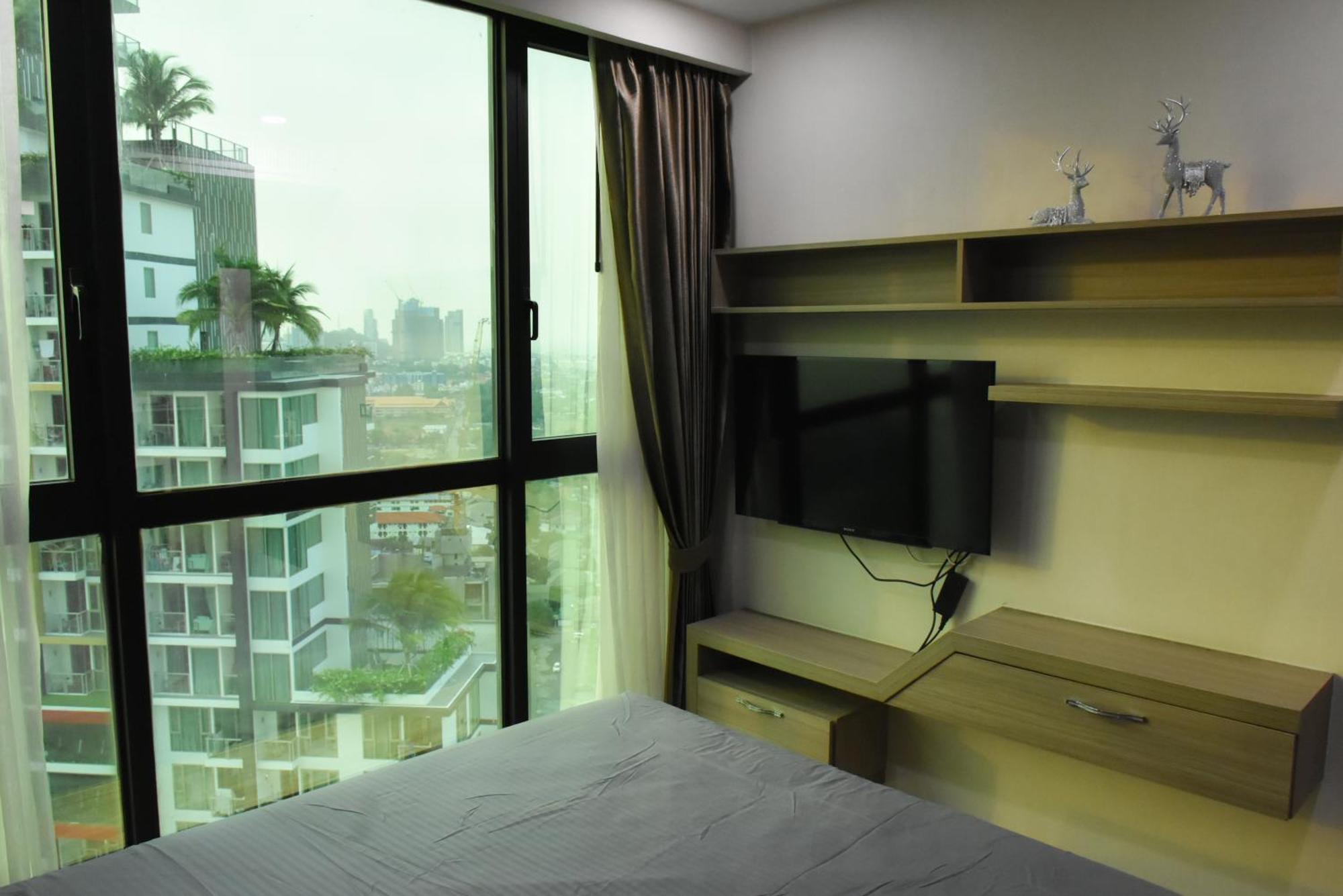 Dusit Grand Condo View Praia de Jomtien Quarto foto